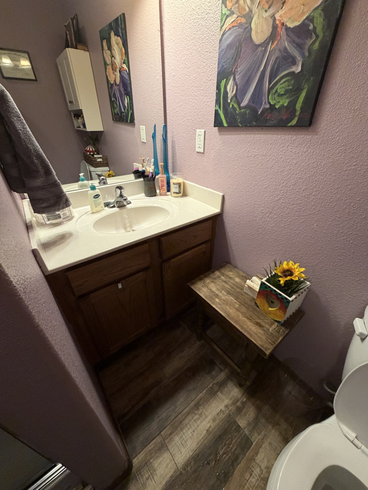 Bathroom Vanity — Original Photos: The same bathroom vanity with the counter cleared and supplies organized.