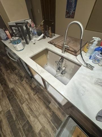 Kitchen sink before cleanup, second view