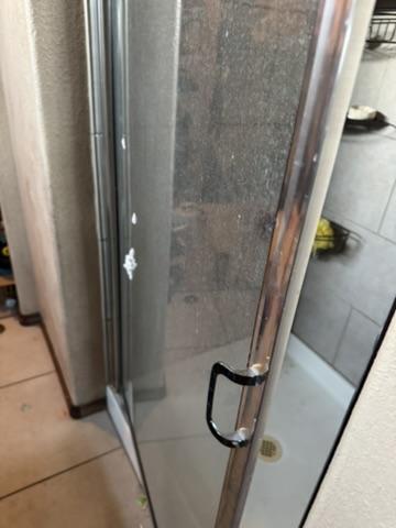 Shower enclosure before cleanup