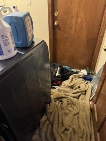 Laundry area before cleanup